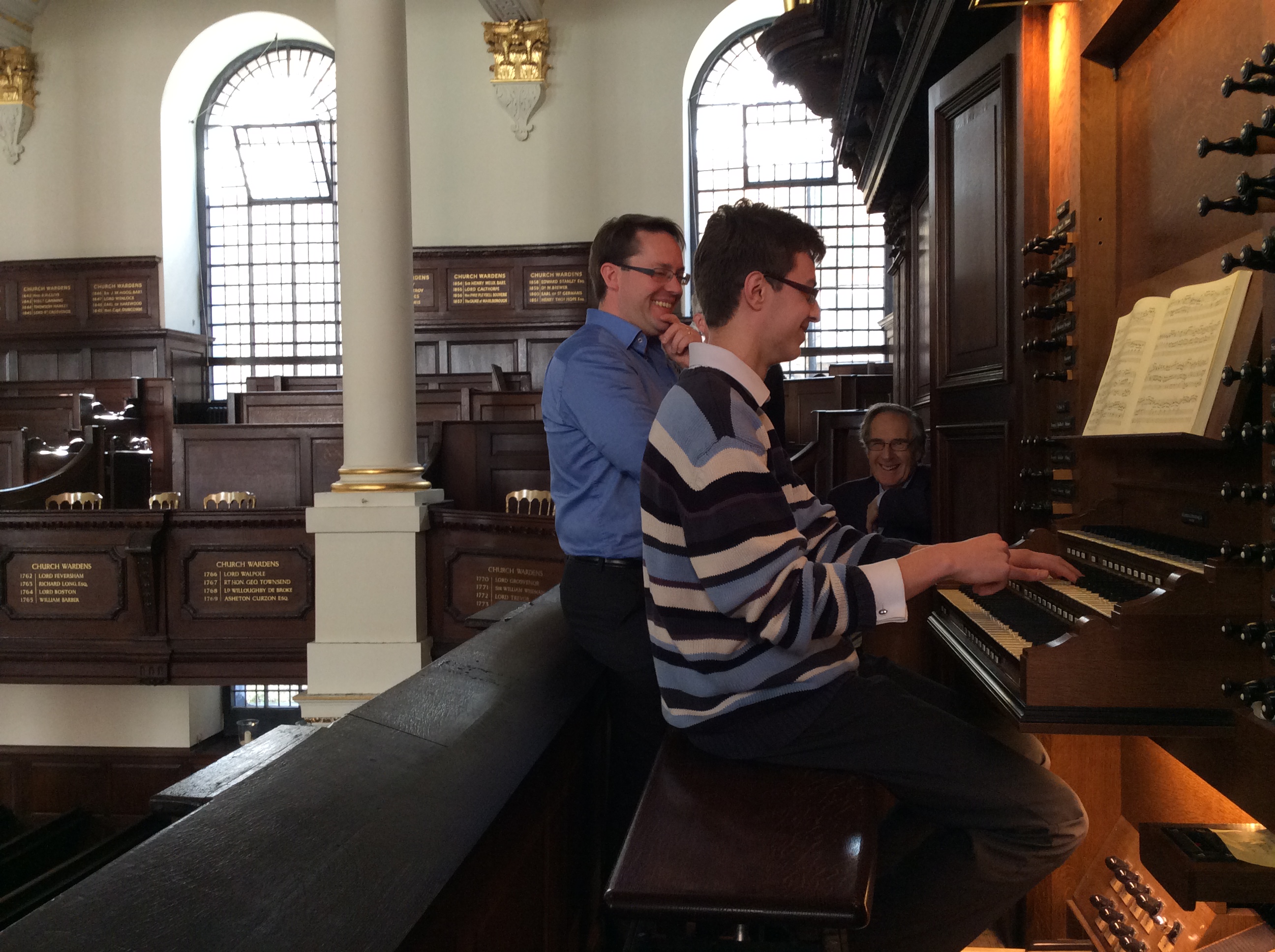 Image: Ashley Wagner at the organ with Robin Walker and Peter St John Stokes